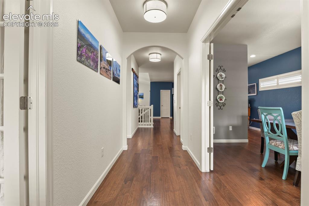 Image 8 of 47: Stunning hardwood floors all throughout the main level.