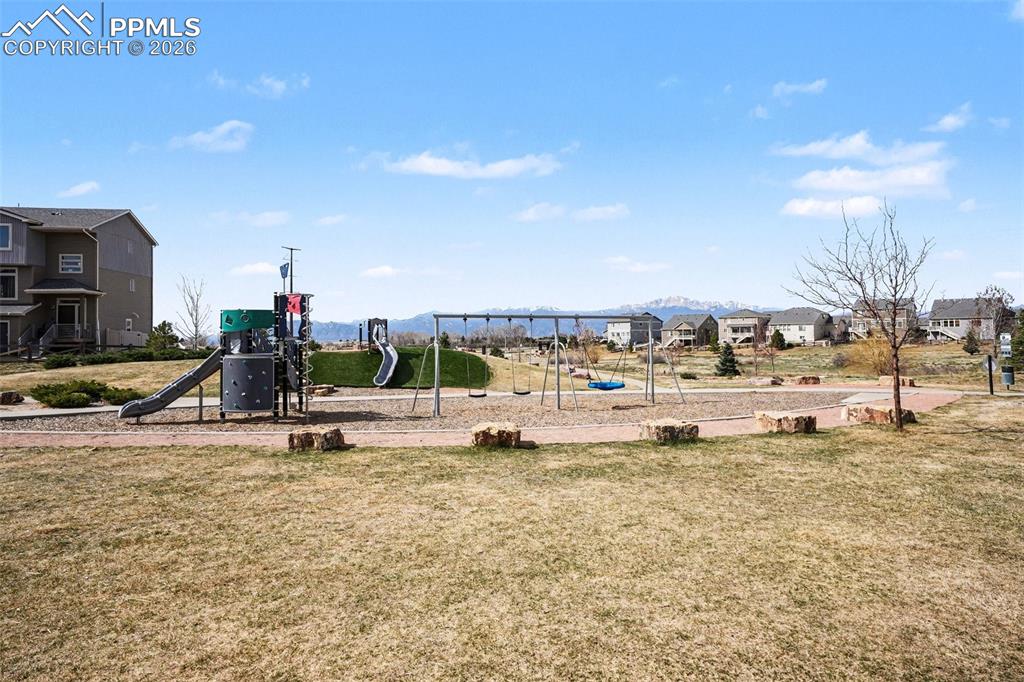 Image 20 of 20: Wonderful Playground just outside the front door!