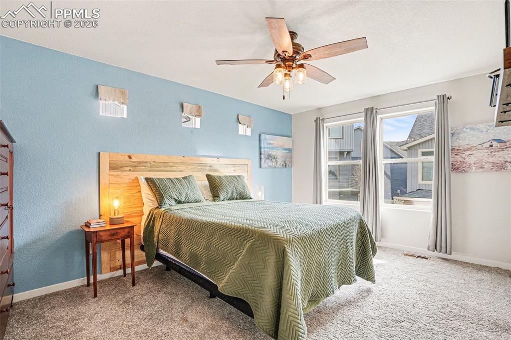 Image 8 of 20: Master Bedroom