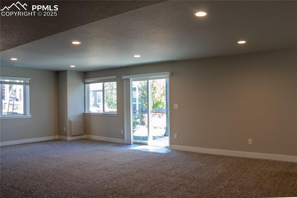 Image 25 of 30: Carpeted empty room featuring recessed lighting and baseboards