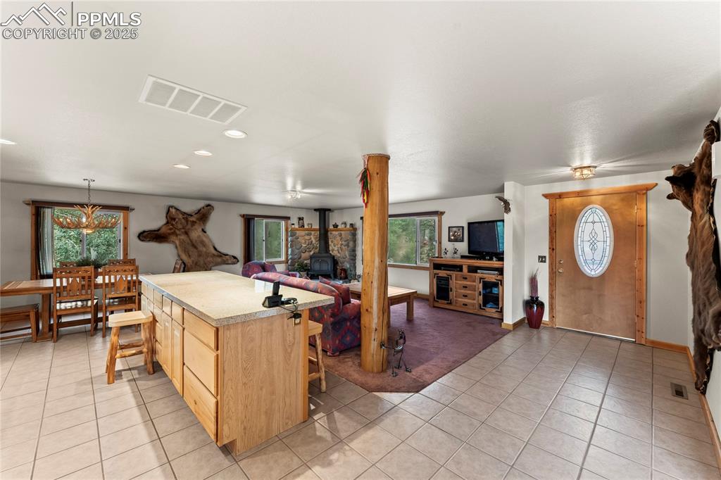 Image 17 of 42: Custom solid wood post, front door, living room, kitchen, dining room 