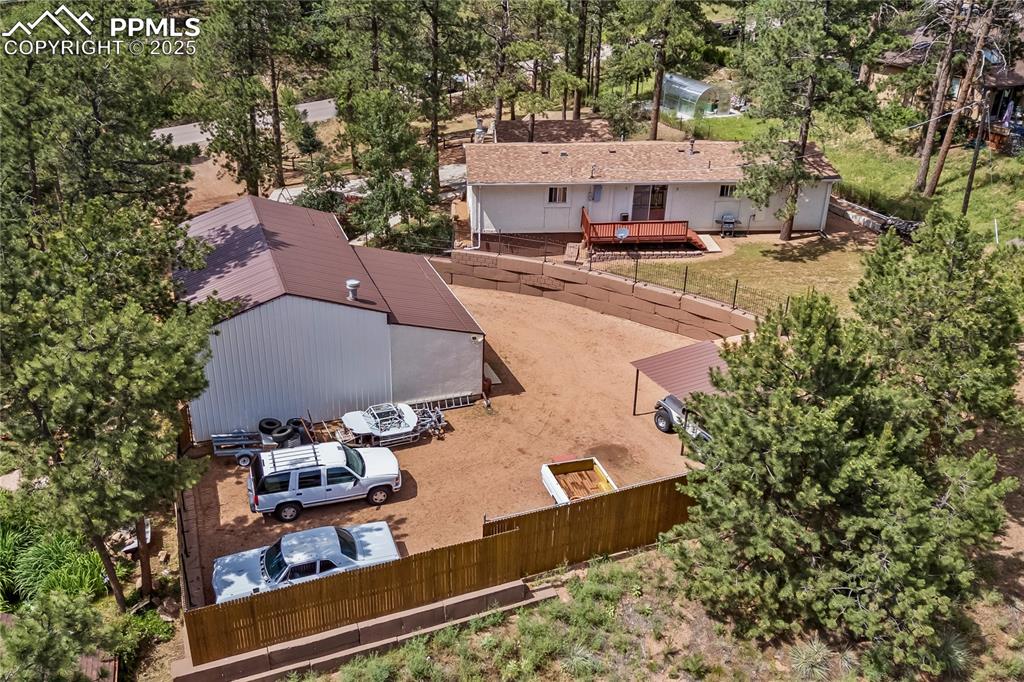 Image 2 of 42: Ariel view featuring custom built retaining walls to maximize lot size and 