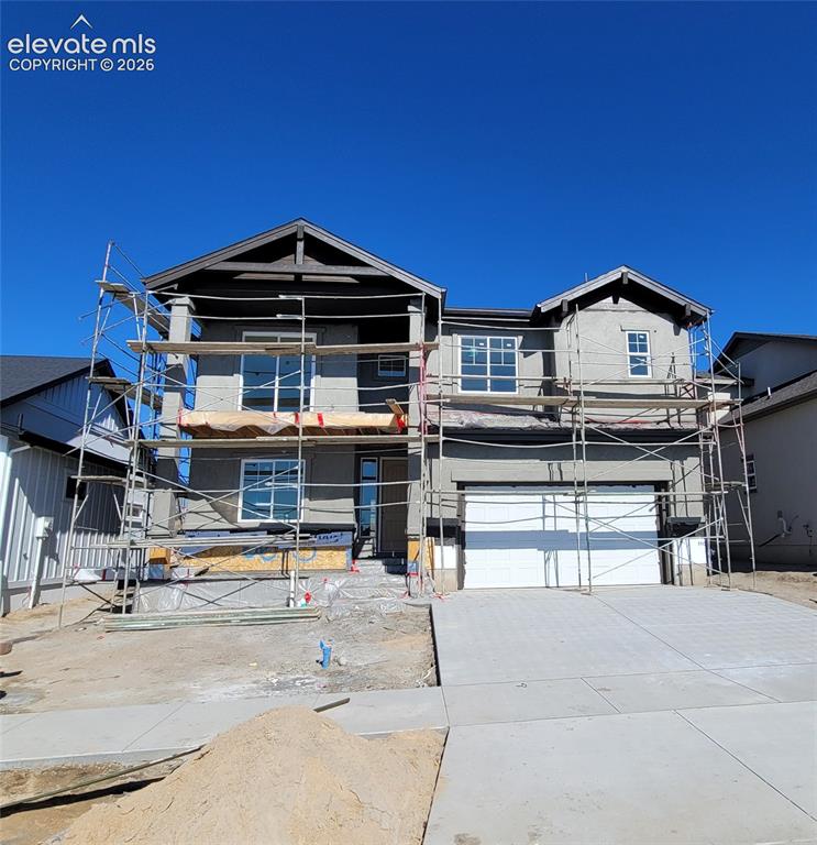 Image 1 of 30: Eastleigh II-Two Story-3 Car Tandem Garage-Craftsman Elevation-Finished Bas