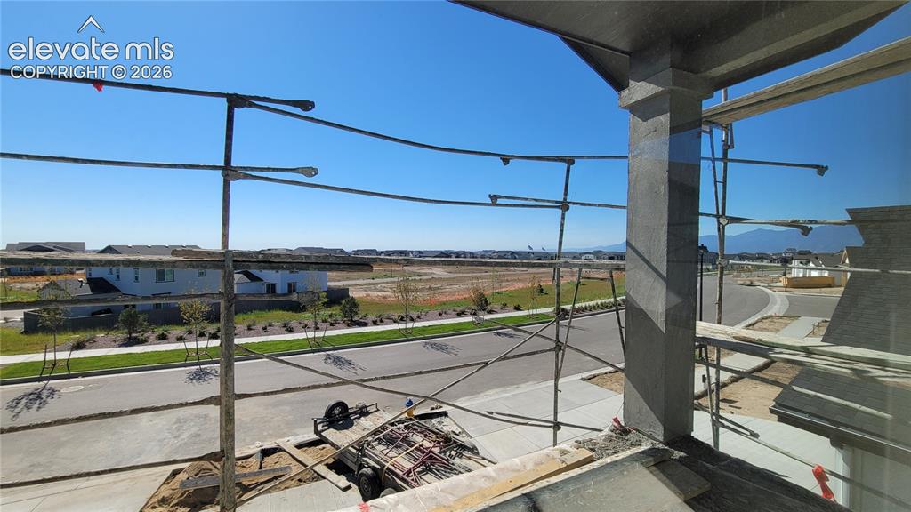 Image 13 of 30: Covered Deck off the loft! Please, excuse our dust as this home is currentl