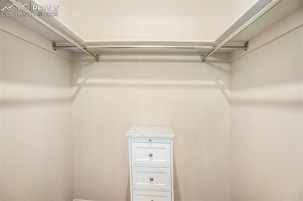 Image 12 of 34: Plenty of space in walk-in closet