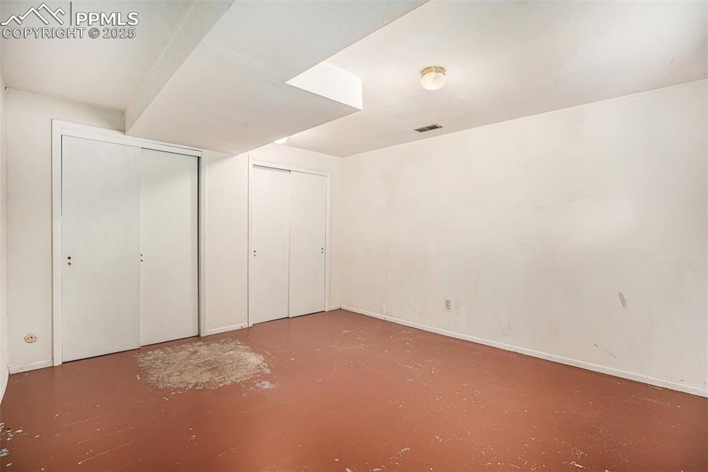 Image 22 of 34: Bedroom in Basement