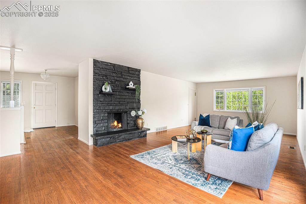 Image 5 of 34: Beautiful brick fireplace