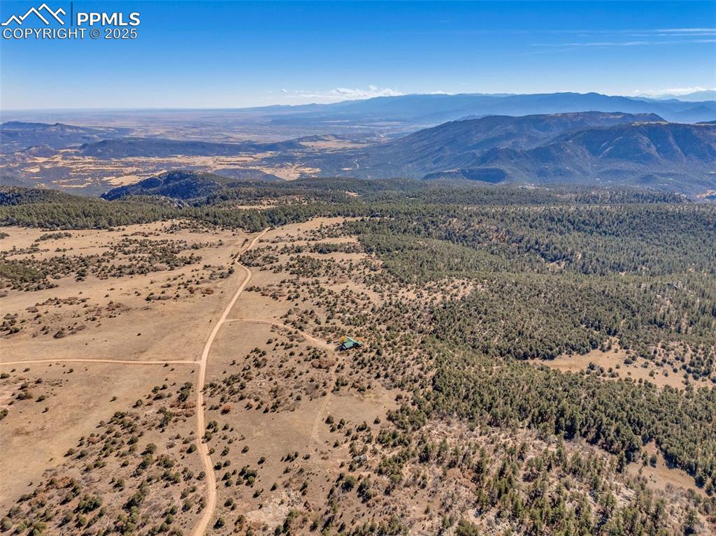 Image 48 of 50: Aerial view of a mountainous background