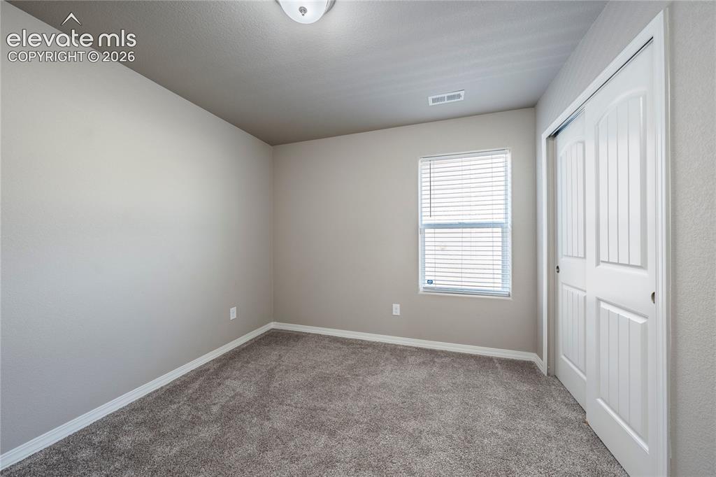 Image 9 of 13: Bedroom