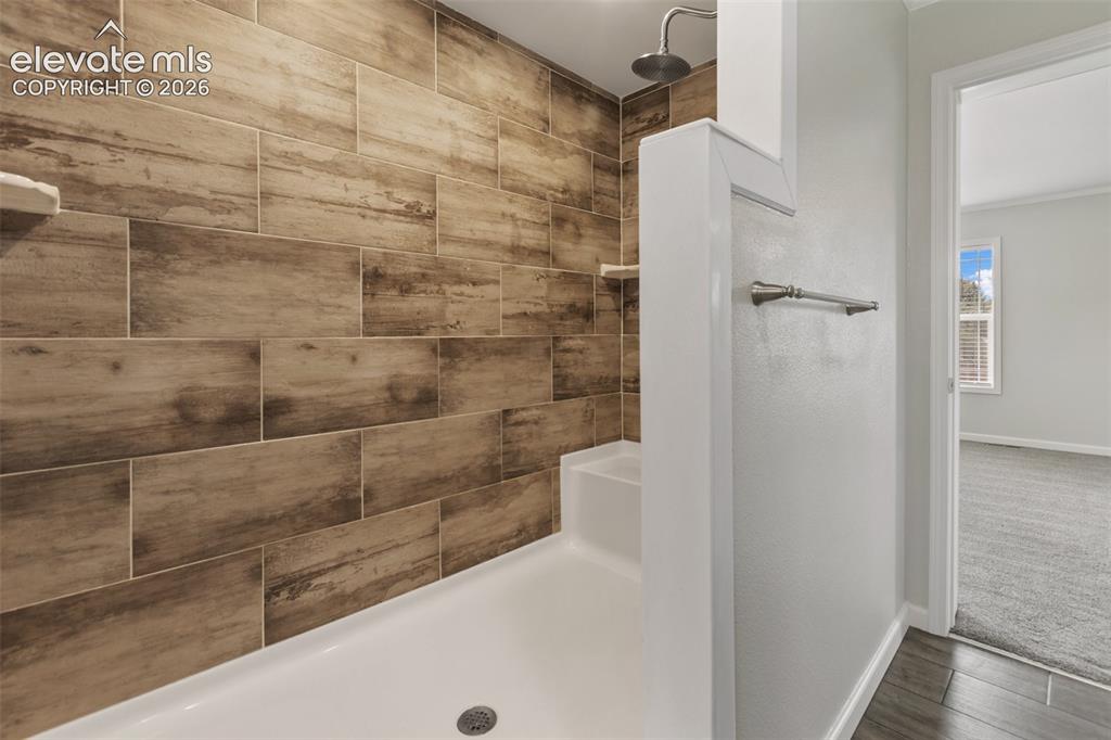 Image 20 of 45: Primary Bathroom oversized shower.