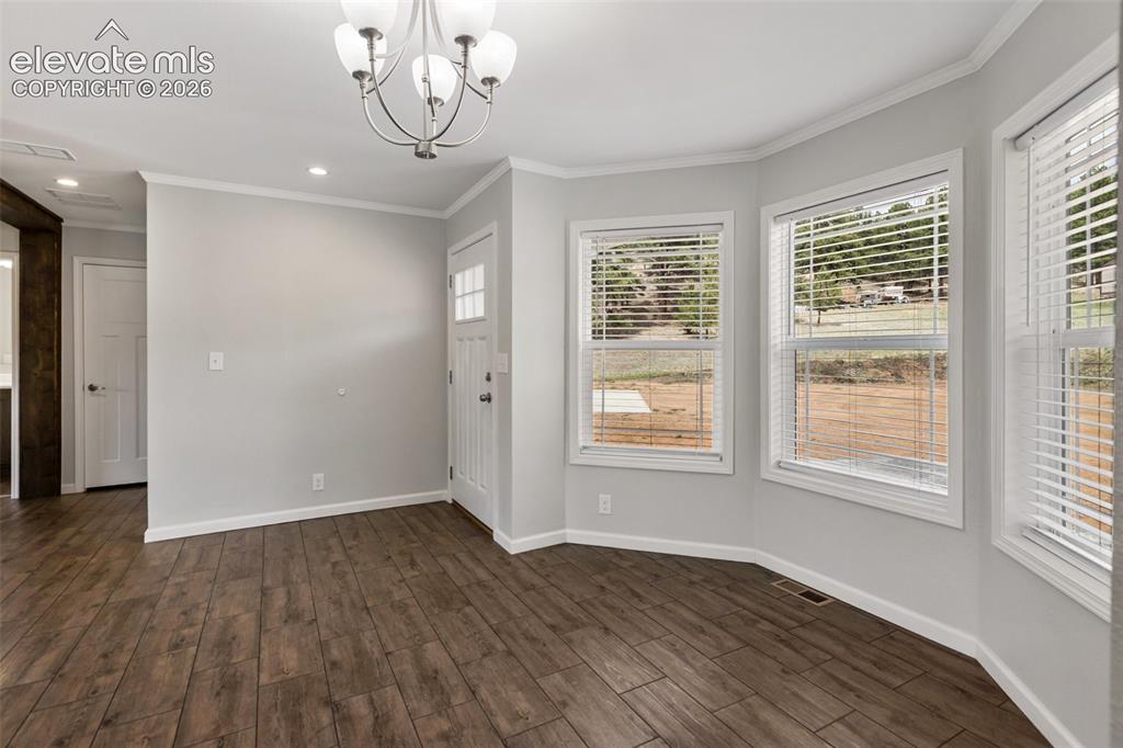 Image 4 of 45: Dining room and entry
