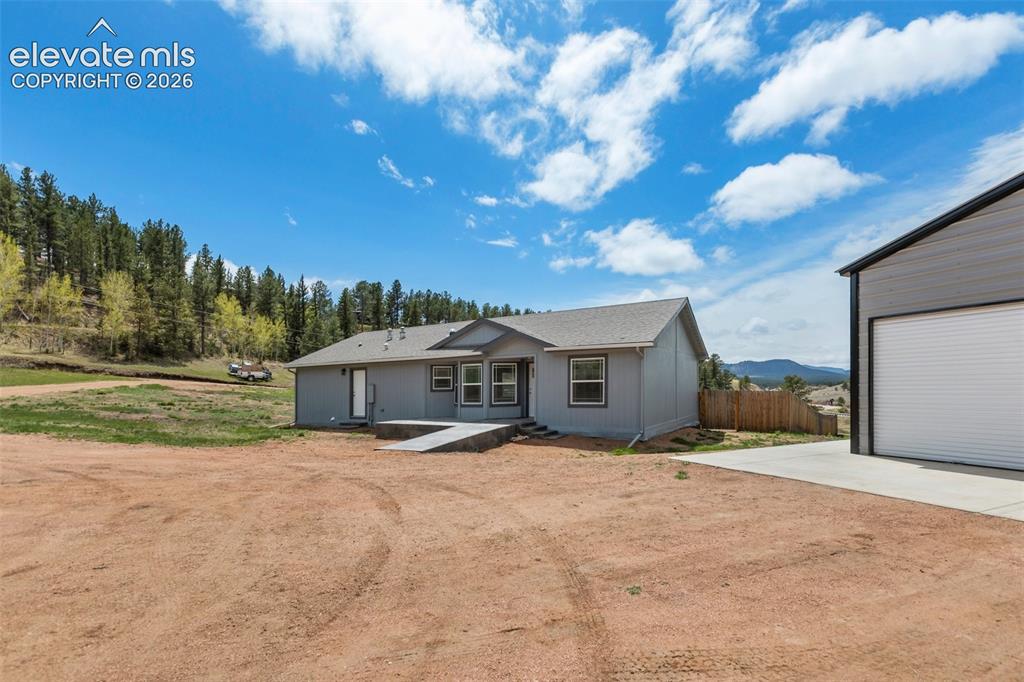 Image 41 of 45: Front of property with garage