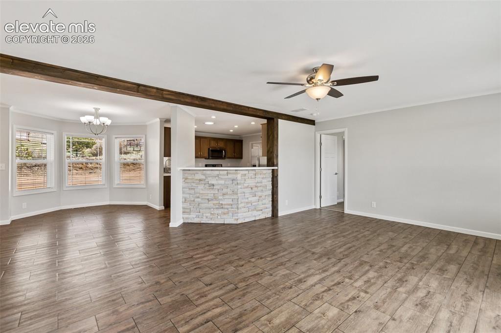 Image 9 of 45: Living room, kitchen and dining room