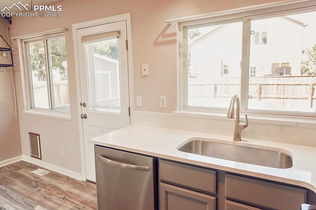 Image 10 of 38: Kitchen with NEW Sink & NEW Counter-Tops