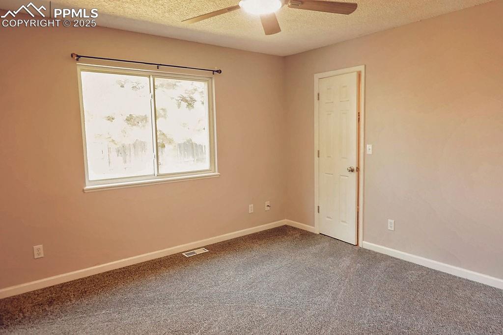Image 12 of 38: Primary Bedroom