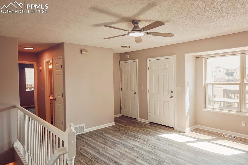 Image 4 of 38: Living Room (Looking Towards Entry, Garage & Hallway