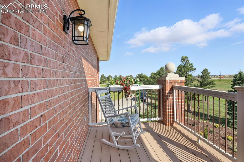 Image 19 of 50: Deck off the Primary upstairs