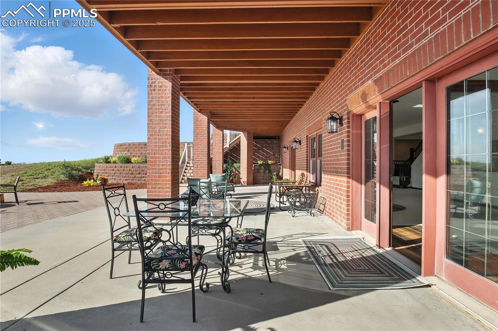 Image 43 of 50: View of patio / terrace featuring outdoor dining space