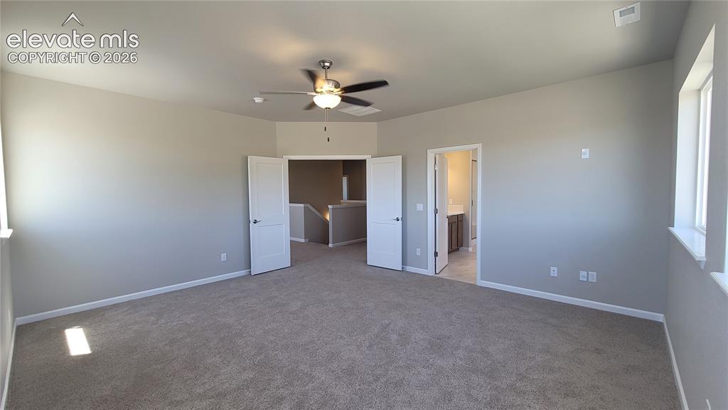 Image 19 of 50: Master Bedroom