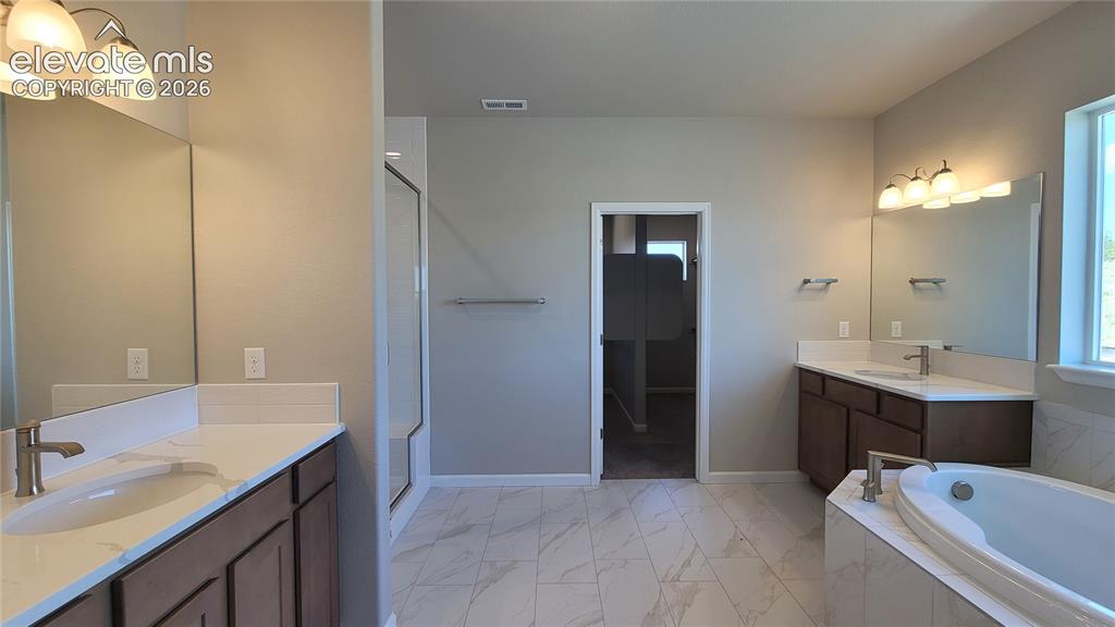 Image 20 of 50: Master Bathroom