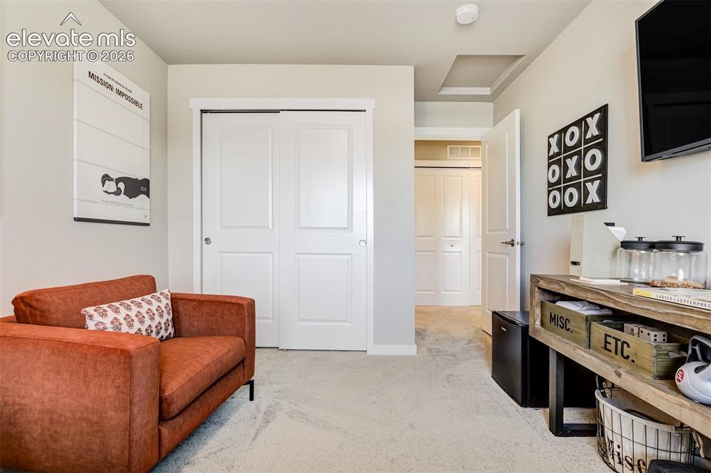 Image 33 of 49: Upstairs bedroom