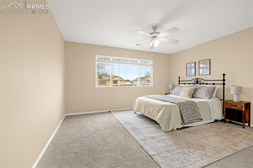 Image 15 of 36: Spacious Primary Bedroom