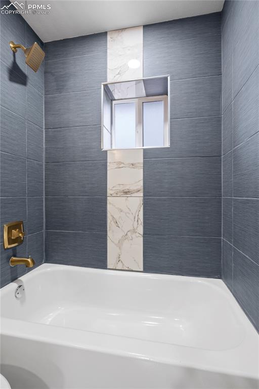 Image 22 of 26: Full bath featuring washtub / shower combination
