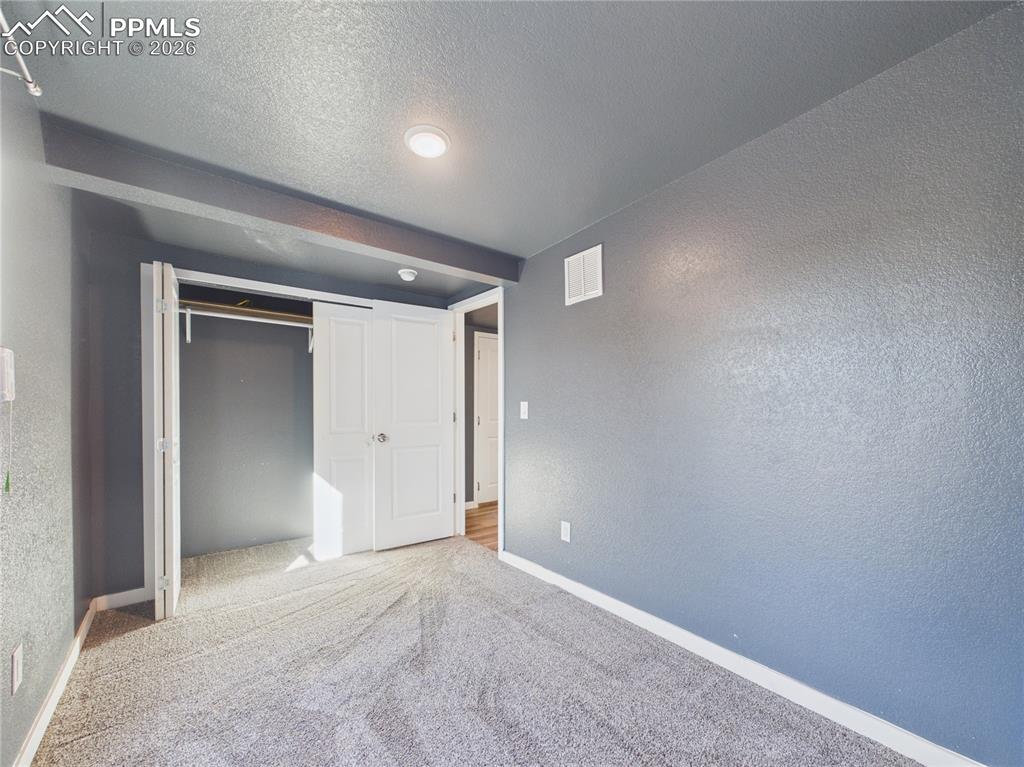 Image 22 of 36: Bedroom