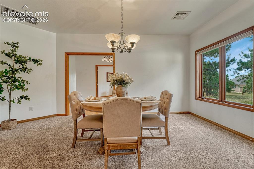 Image 17 of 50: Dining room.