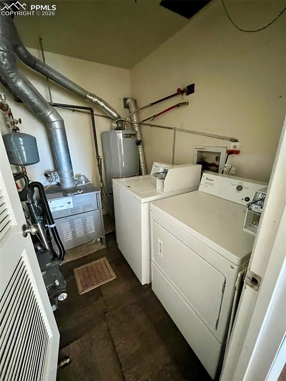 Image 5 of 26: Upper level, newer coin operated washer & dryer.