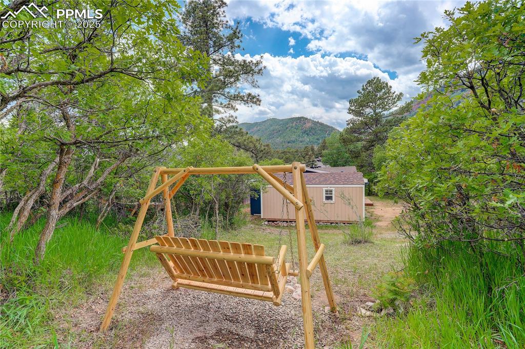 Image 32 of 43: Storage shed adjacent to the house.