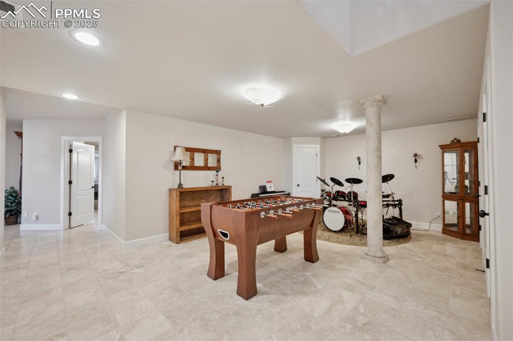 Image 32 of 48: Game room featuring recessed lighting, visible vents, and baseboards