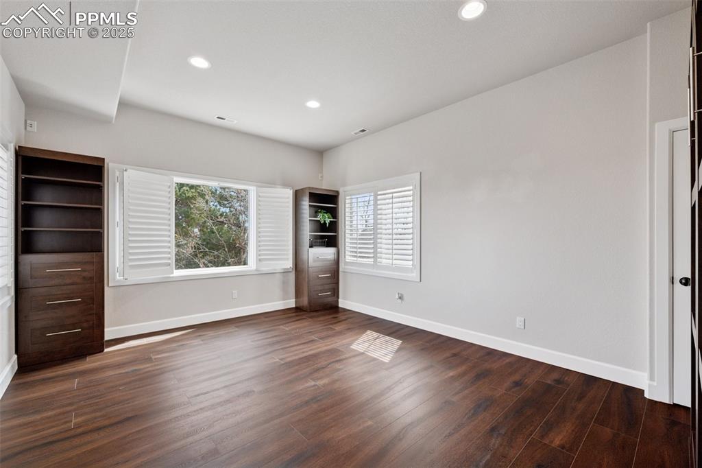 Image 41 of 48: Unfurnished bedroom with visible vents, baseboards, recessed lighting, and