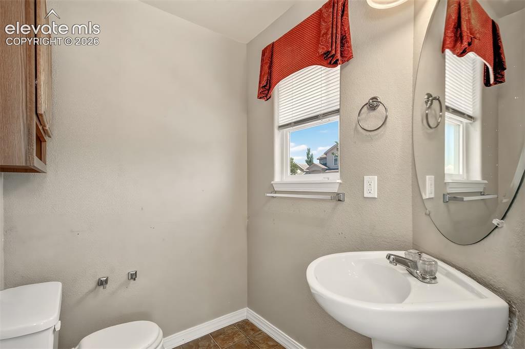 Image 19 of 26: Half bath lower level
