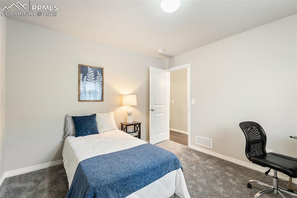 Image 24 of 43: Bedroom