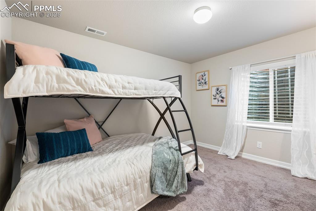 Image 29 of 43: Bedroom