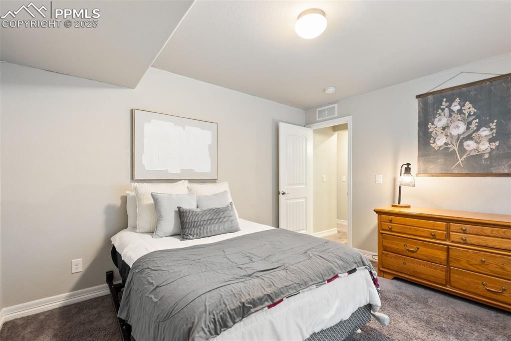 Image 32 of 43: Bedroom