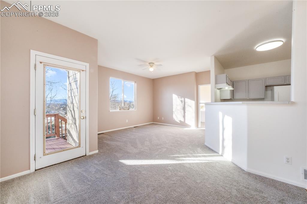 Image 11 of 50: Dining area with access to to back yard and walk out basement with all new 