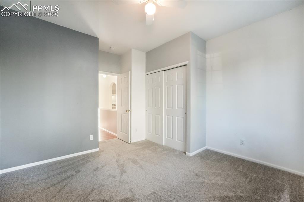 Image 27 of 50: Main floor 2nd bedroom with new carpet