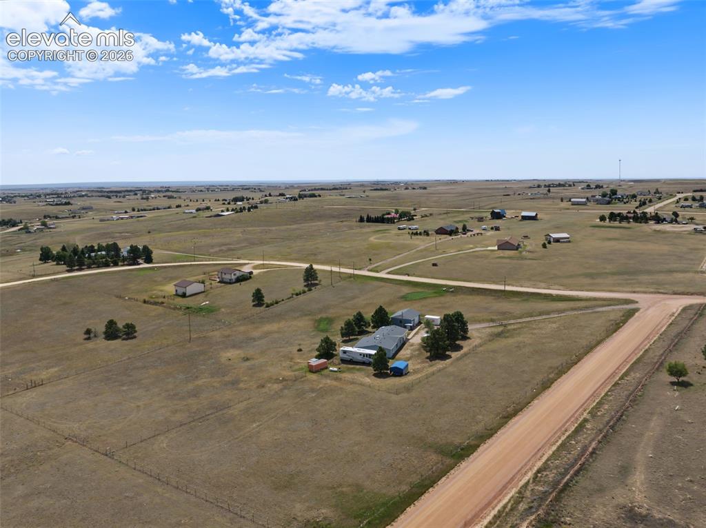 Image 37 of 38: Expansive rural landscape featuring multiple parcels and dirt roads
