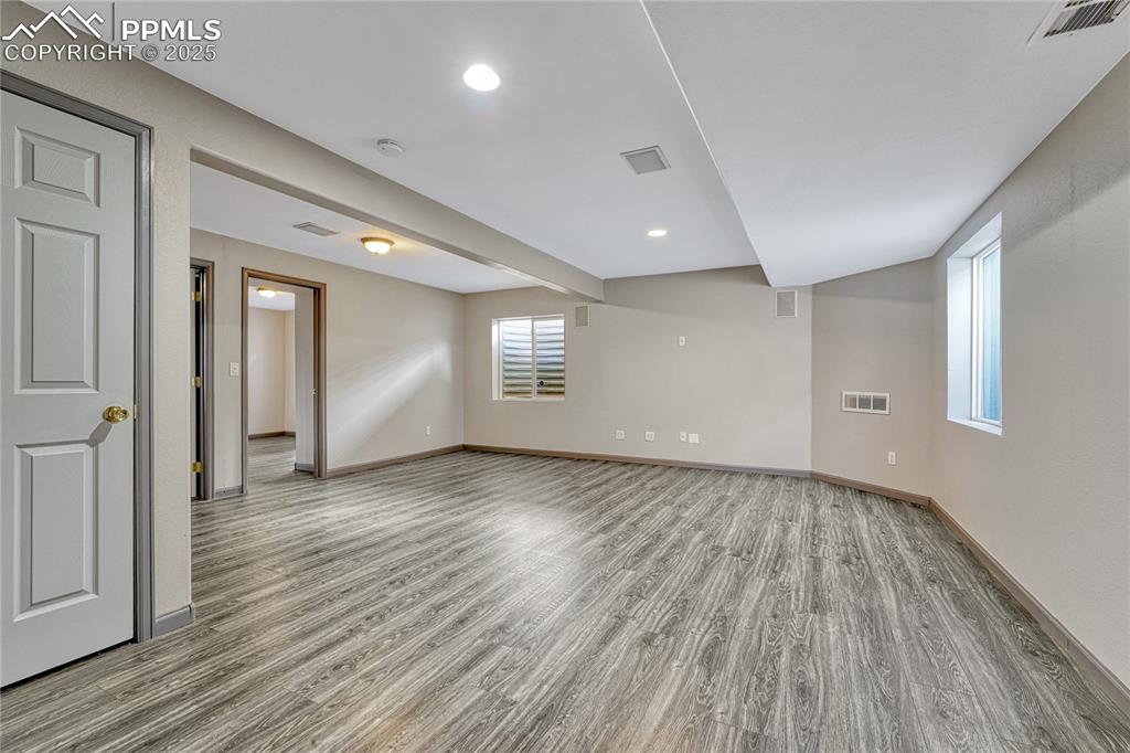 Image 26 of 47: Rec room in finished basement