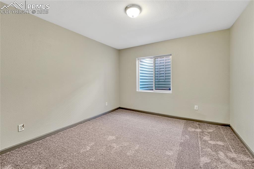 Image 30 of 47: Bedroom #4 with new carpet