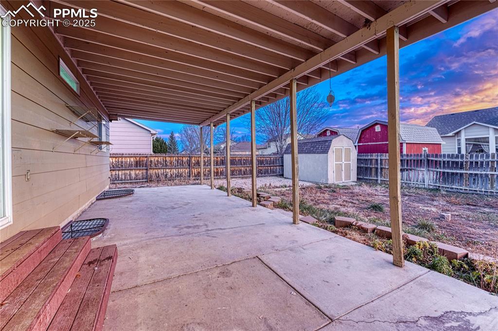 Image 35 of 47: Covered back patio