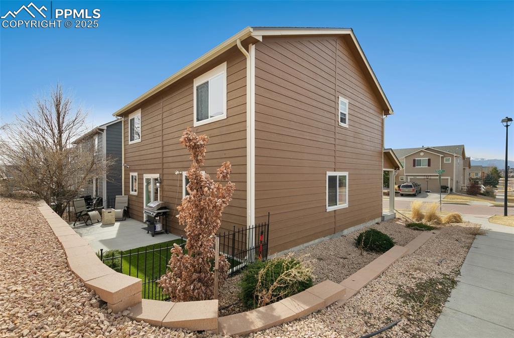 Image 16 of 17: Maintenance Free Home with Concrete Patio
