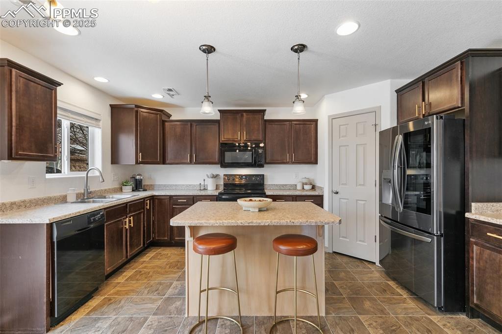 Image 5 of 17: Kitchen With Walk In Pantry 