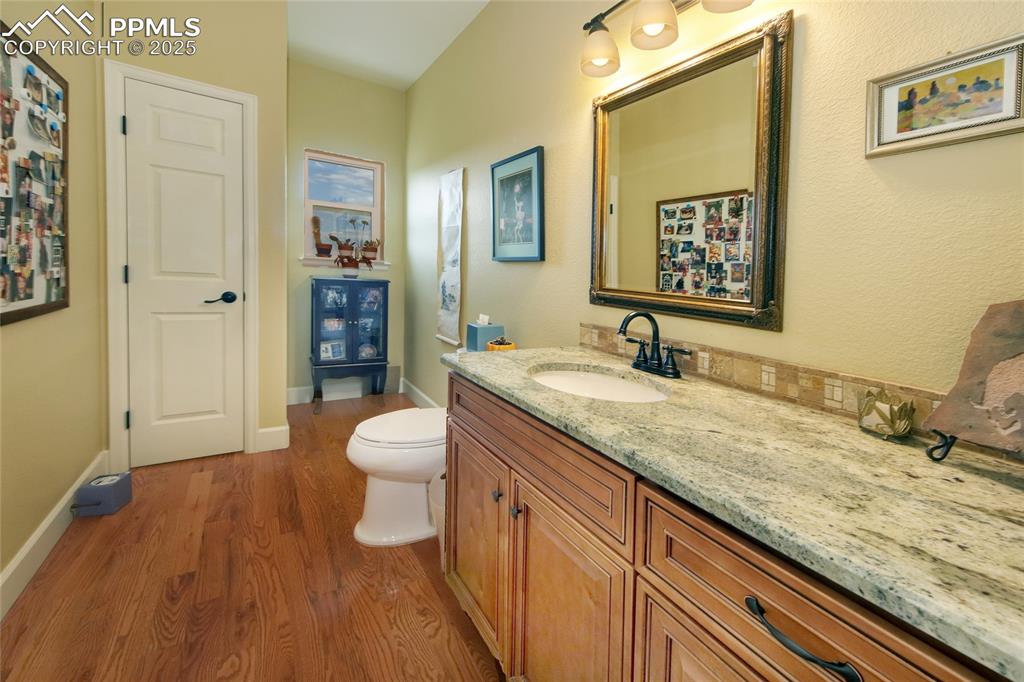 Image 22 of 36: Powder room which is on the main level