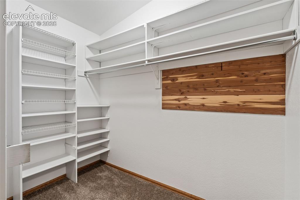 Image 26 of 50: Master Walk-in closet