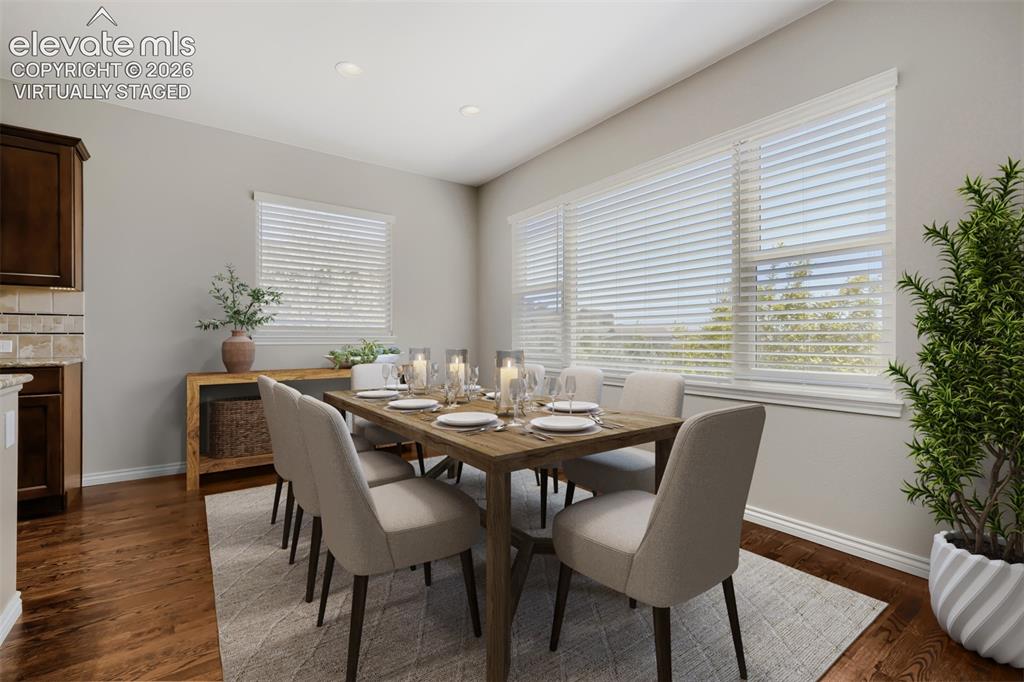 Image 10 of 50: Virtually staged, beautiful dining room with spacious design, open concept