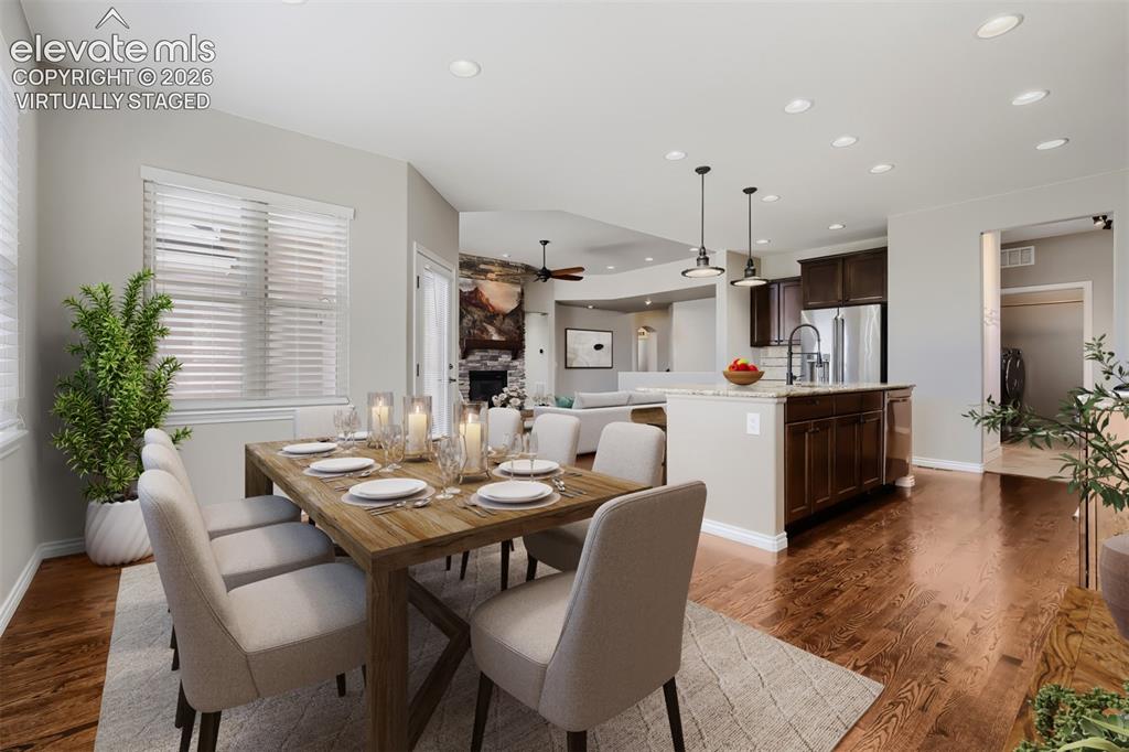 Image 12 of 50: Virtually staged, beautiful dining room with spacious design, open concept