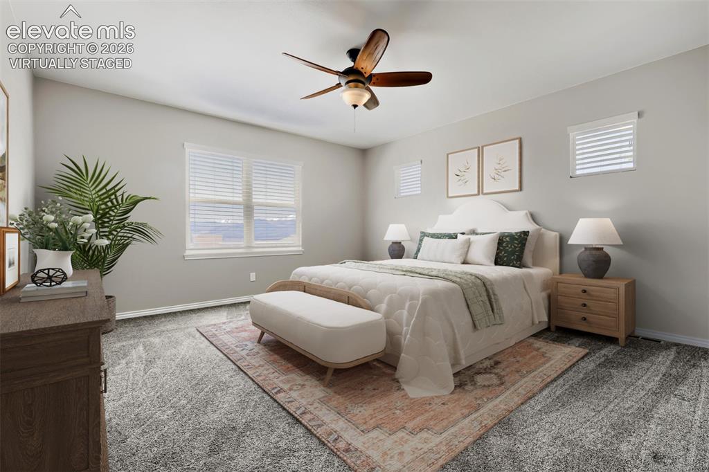 Image 20 of 50: Virtually staged primary bedroom with lux bath and huge closet.
